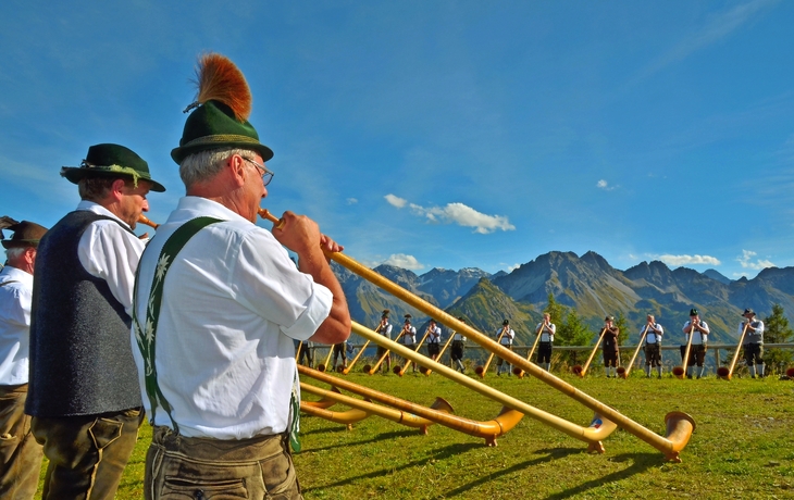 Konzert mit Alphorn im Gebirge